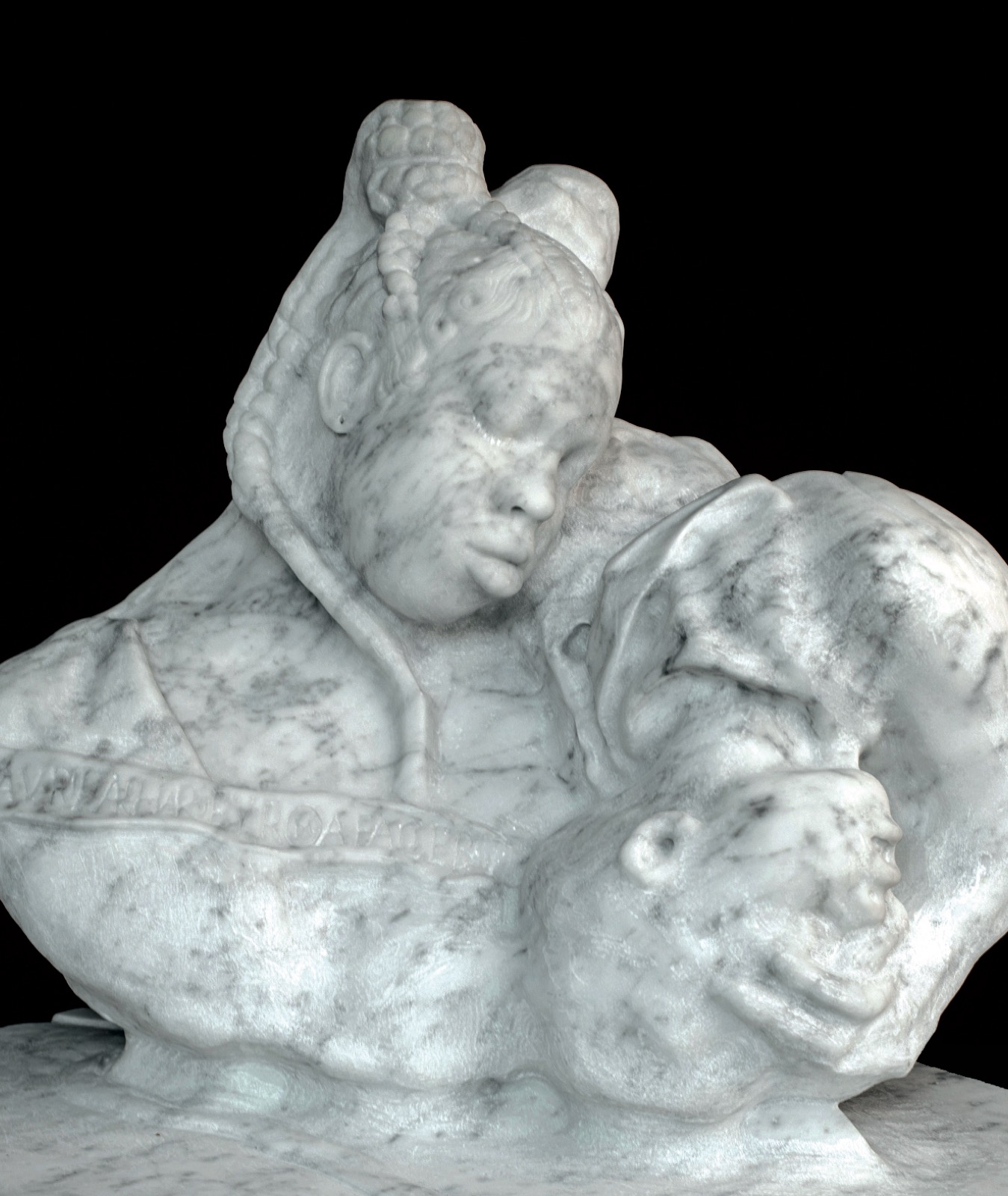 Mother / Child, carved in marble.